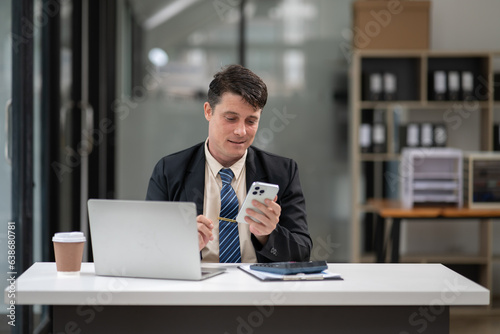 Businessman talking to customers online together at the office.