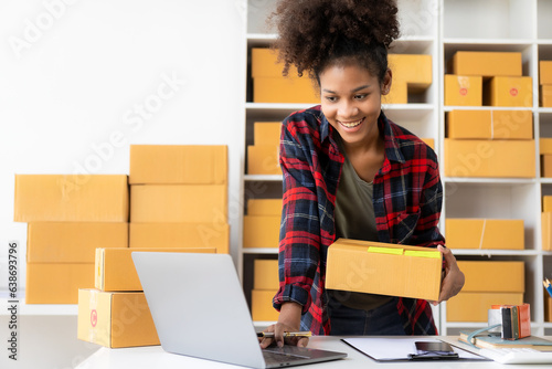 Entrepreneurs working from home Online shopping, ecommerce, internet banking, spending money, work from home ideas with parcel boxesSME business ideas