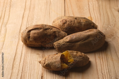 Cilembu sweet potato is a cultivar of sweet potato, a local race originating from Cilembu Village, Pamulihan District, Sumedang, West Java. Ipomoea batatas 'Cilembu'. Baked Cilembu sweet potato. photo