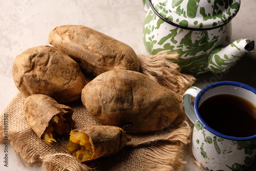 Cilembu sweet potato is a cultivar of sweet potato, a local race originating from Cilembu Village, Pamulihan District, Sumedang, West Java. Ipomoea batatas 'Cilembu'. Baked Cilembu sweet potato. photo