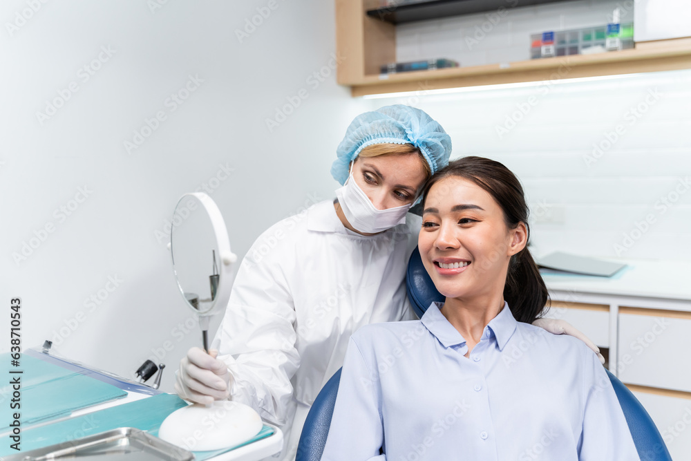 Caucasian dentist examine tooth for young girl at dental health clinic. Caucasian dentist examine tooth for young girl at dental health clinic.
