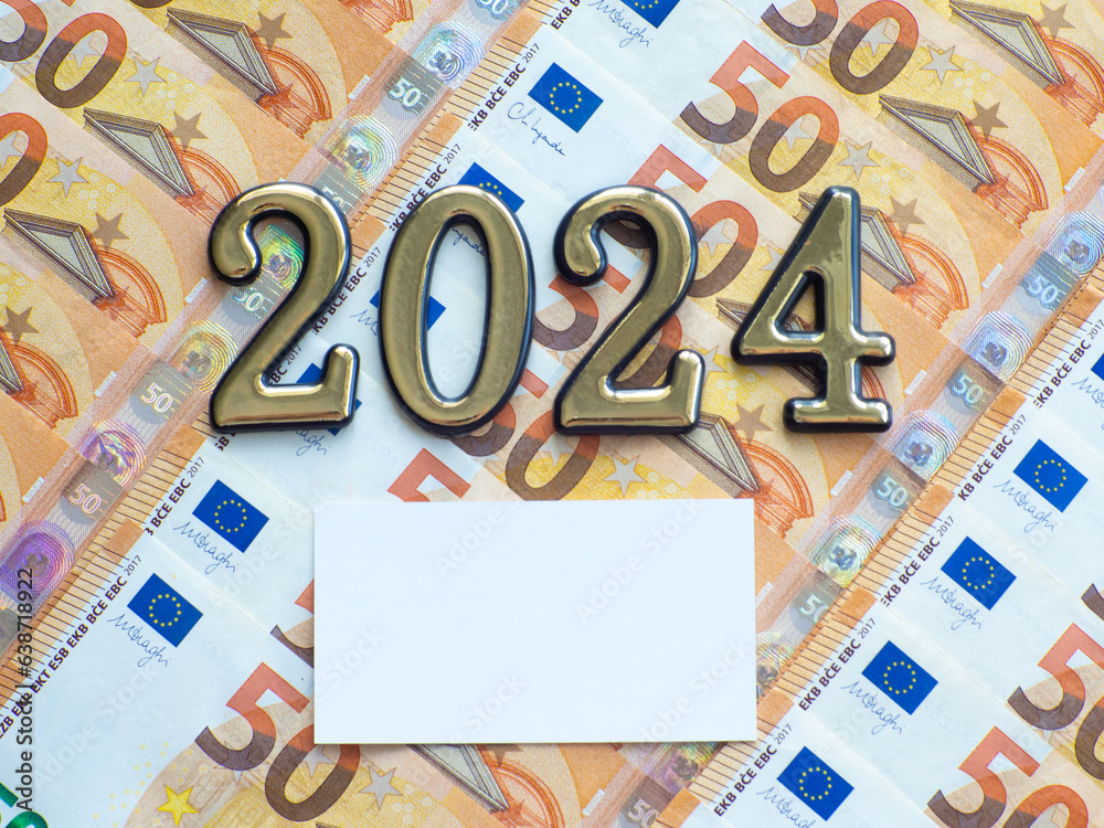 Background of the fifty euros banknotes and 2024 with copy space Background of the fifty euros banknotes and 2024 with copy space