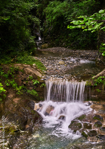 Fototapeta Naklejka Na Ścianę i Meble -  Waterfall in beautiful creek