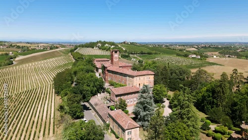 Beautiful Uviglie old castle near Casale Monferrato in Italy. Aerial backward view