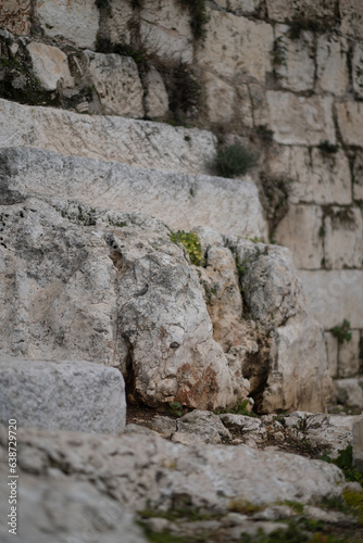 Closeups of old stones from Roman-era and earlier construction, reused in the Ottoman-era wall of the Old City of Jerusalem.