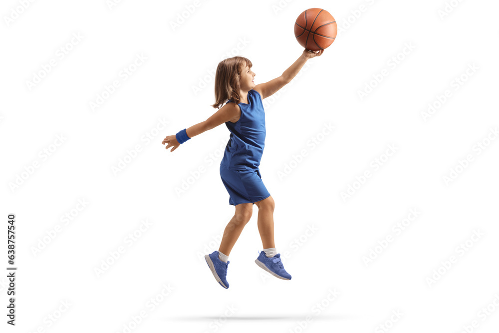 Little girl in a blue sports jersey shooting a layup