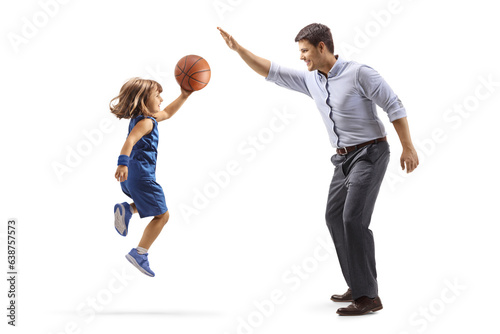 Father and daughter playing basketball
