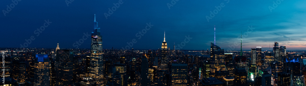 Panoramic view of New York cityscape at night