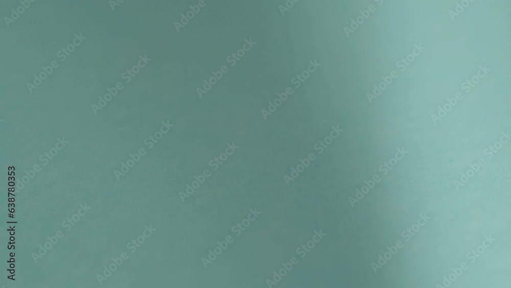 Camera movement on a paper blue background close-up. Selective focus Camera movement on a paper blue background close-up. Selective focus