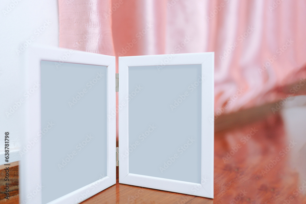 Fototapeta premium Blank picture frame with empty space on the headboard.