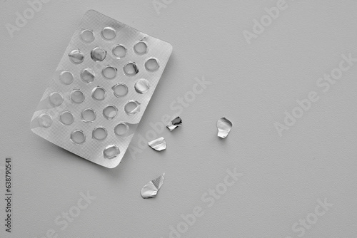 Pills blister pack on a white background. Top view food supplements empty packaging. Medicine shortage concept. Running out of drugs. 
