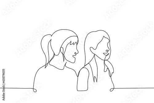 women stand nearby and smile look away - one line art vector. concept of girlfriend, sister or lovers enjoy each other