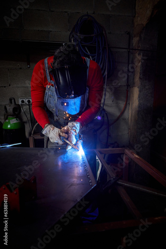 Concentrated craftsman welding metal detail © ADDICTIVE STOCK CORE