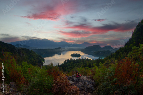 Fototapeta Naklejka Na Ścianę i Meble -  Lake Bled Slovenia. Beautiful mountain lake with small Pilgrimage Church. Most famous Slovenian lake and island Bled with Pilgrimage Church of the Assumption of Maria and Bled Castle in background.