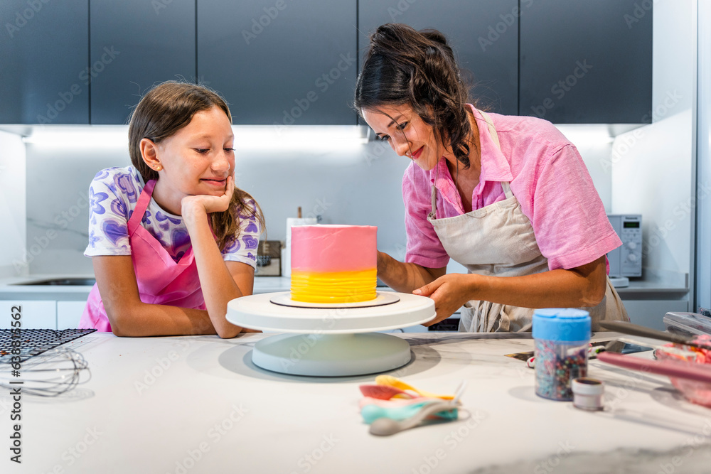 Cooking Family. Mother and Daughter enjoy cooking together. Cooking Family. Mother and Daughter enjoy cooking together.