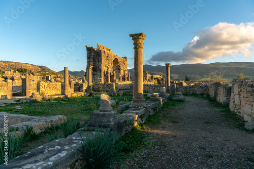 Captivating remnants of ancient civilization Volubilis, Morocco. These well-preserved ruins transport you to a bygone era, where you find the legacy  in an aintricate architecture photo