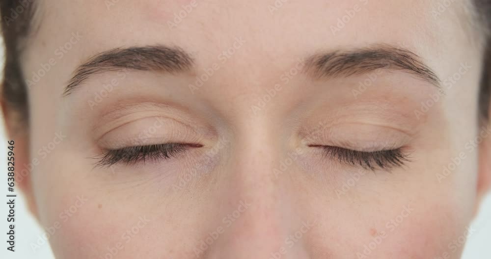 Close up, crazy eyes blink in different ways. Cheerful woman face