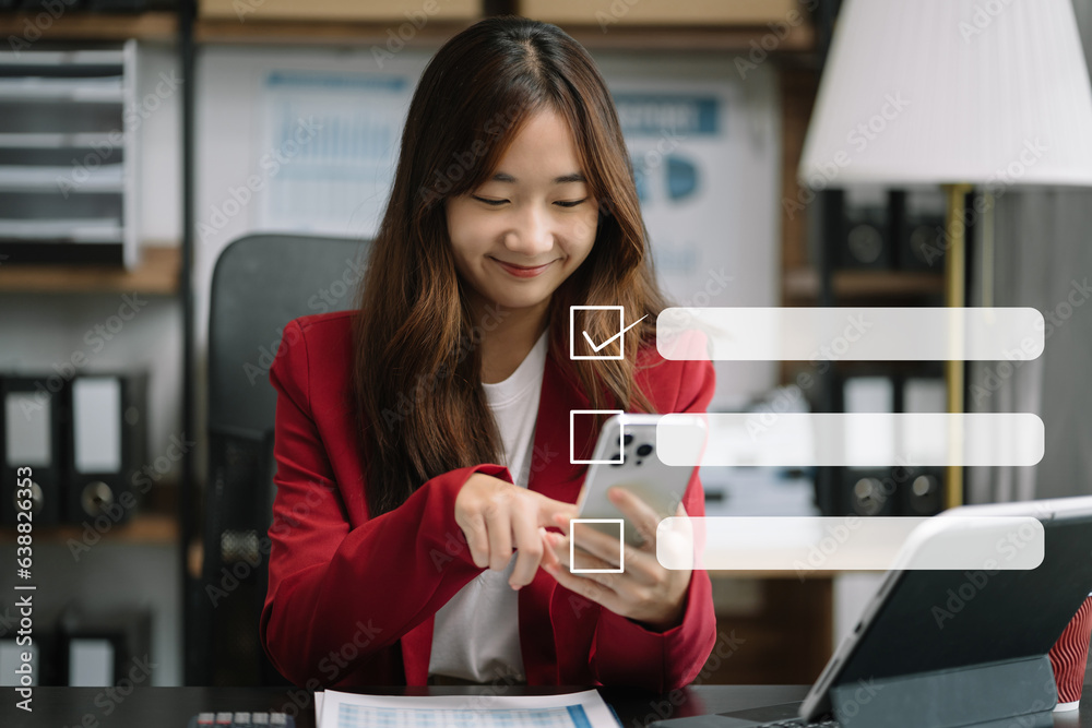 Business performance checklist concept, business woman using smartphone and laptop doing online checklist survey, filling out digital form checklist. Business performance checklist concept, business woman using smartphone and laptop doing online checklist survey, filling out digital form checklist.