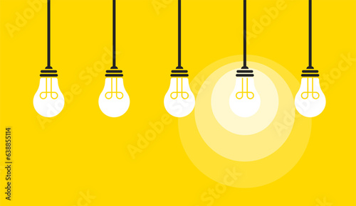 Vector illustration of white light bulbs hanging on wires on a yellow background. One of them is lit, symbolizing ideas and creativity. (EPS 10) photo