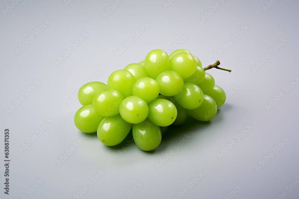 Grapes green fruit on a solid color background. Isolated object in photo studio. Commercial shot with copyspace. Grapes green fruit on a solid color background. Isolated object in photo studio. Commercial shot with copyspace.