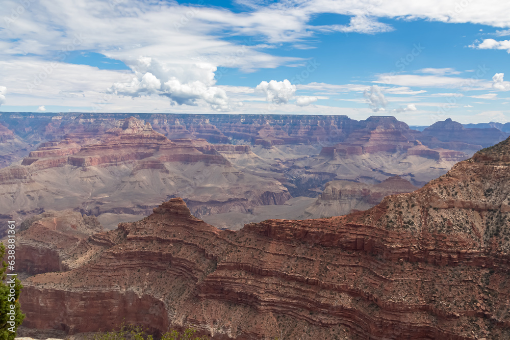 Panoramic aerial view from South Kaibab hiking trail at South Rim of Grand Canyon National Park, Arizona, USA, America. Colorado River weaving through valleys and rugged terrain. Natural world wonder