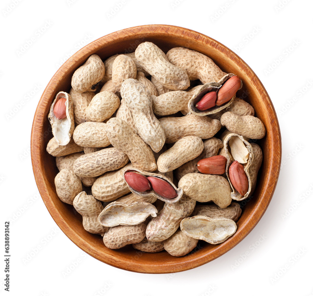 Peanut nuts in a shell wooden plate on a white background. top view