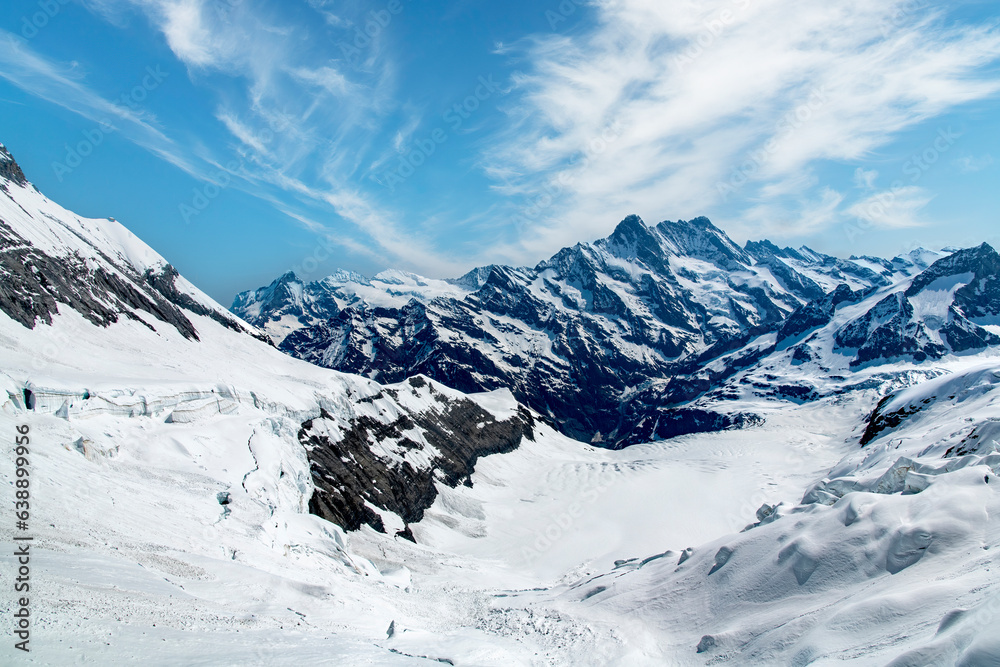 Panoramic view at 3,159 meters of the glacier Ischmeer (Ice Sea) Located behind the south-east face of the Eiger mountain peak in Switzerland close to the Jungfrau mountain in the Bernese Alps