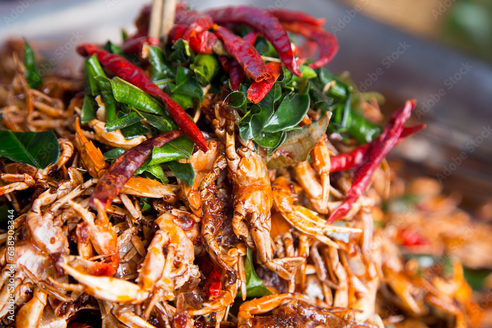 Spicy crab at a street food stall in the city of Bangkok in Thailand..