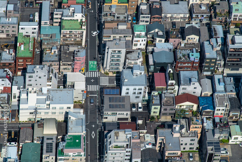 Photography Birds eye view of almost symmetrical  pattern or grid of residential streets and
