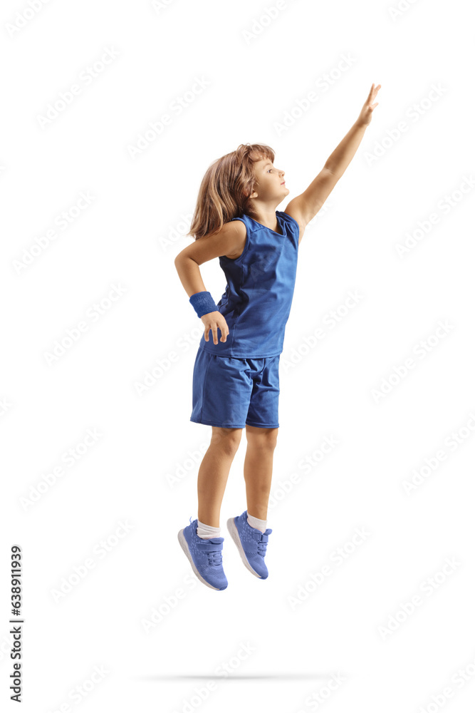 Little girl in a blue basketball jersey jumping Little girl in a blue basketball jersey jumping