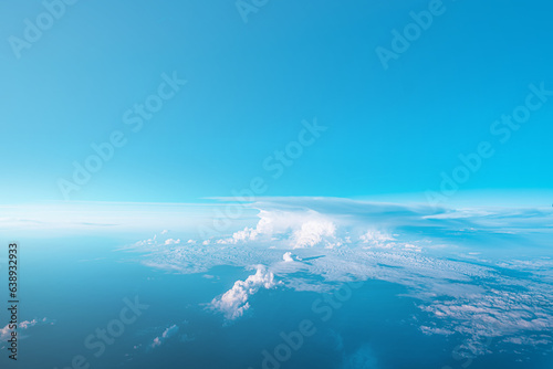 Beautiful blue cloudy sky from aerial view. Airplane view above clouds