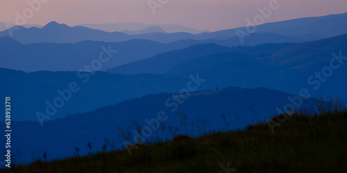 Amazing Carpathian mountains evening layers view near Dragobrat, Ukraine photo