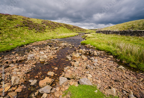 This is the stream that disappears underground very close to Hull Pot in Ribblesdale in the Yorkshire Dales National Park. photo