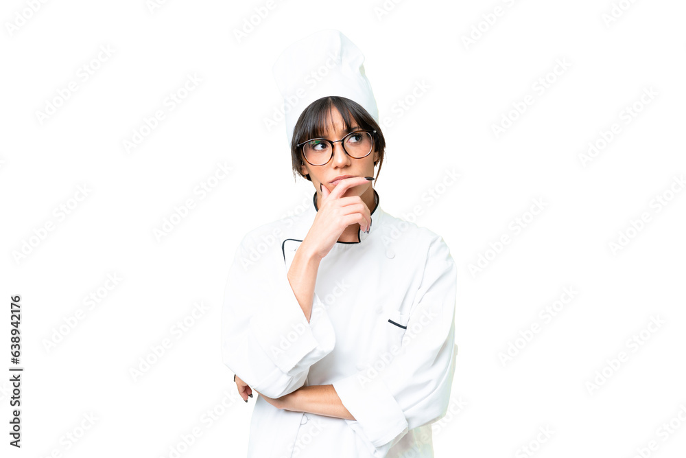 Young caucasian chef woman over isolated chroma key background having doubts and with confuse face expression Young caucasian chef woman over isolated chroma key background having doubts and with confuse face expression