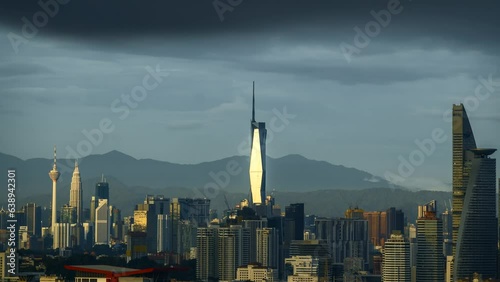  Time-lapse footage of Sunset glow and the stunning reflection of the PNB118 building. Nature's artwork meets architectural marvel