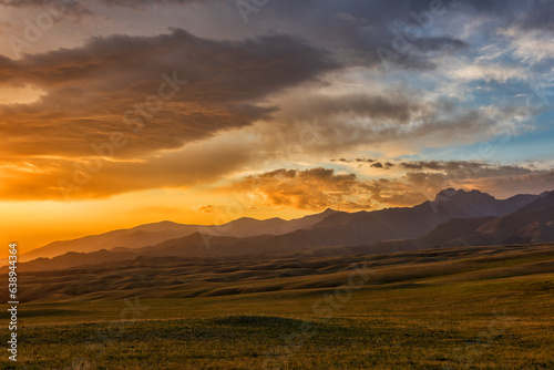 Dawn of the sun in the Dzungarian Alatau in the southeastern part of Kazakhstan