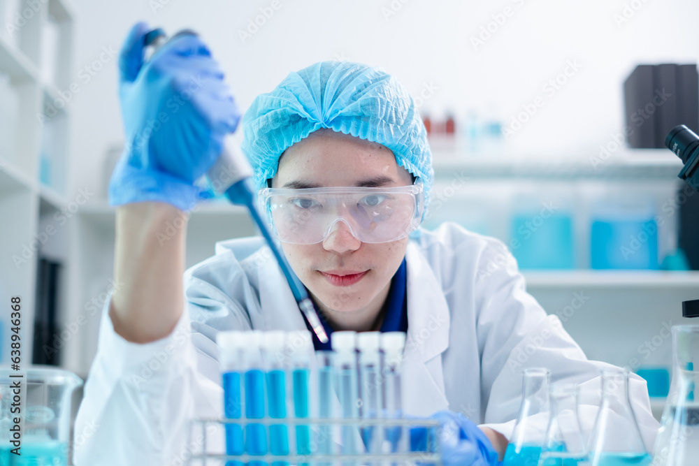 Female scientist in laboratory expertly wields use pipette dripping blue substance with focus on biology, medicine, and biotechnology, research involves careful analysis, experiments, and discoveries. Female scientist in laboratory expertly wields use pipette dripping blue substance with focus on biology, medicine, and biotechnology, research involves careful analysis, experiments, and discoveries.
