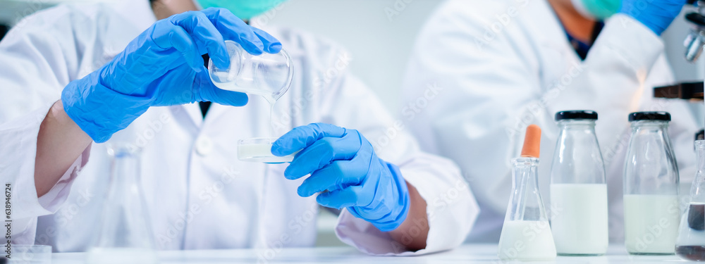 Science banner or background of nutritionist test milk delves quality analysis in laboratory of nutrition, lactose, protein fat percentage, test dairy product for allergic, microbiology and bacterial. Science banner or background of nutritionist test milk delves quality analysis in laboratory of nutrition, lactose, protein fat percentage, test dairy product for allergic, microbiology and bacterial.
