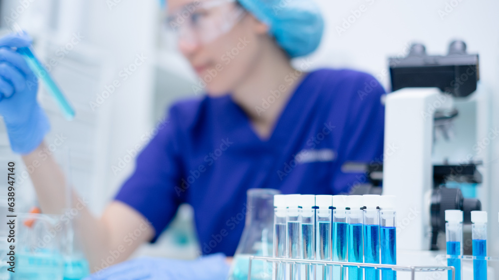 Fototapeta premium Laboratory glassware and test tubes scientific background, extensive research in science medicine, biology and biotechnology chemistry and scientific exploration. Liquid samples analyzed in test tubes