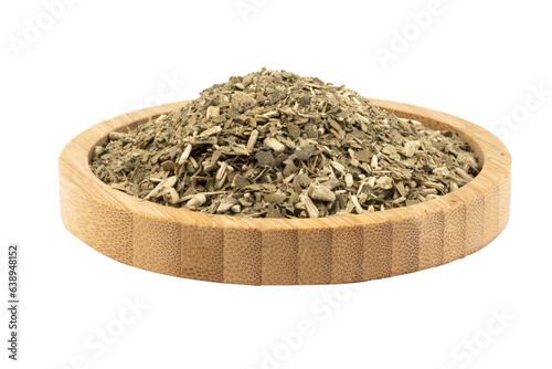 dried mate tea in a wooden bowl