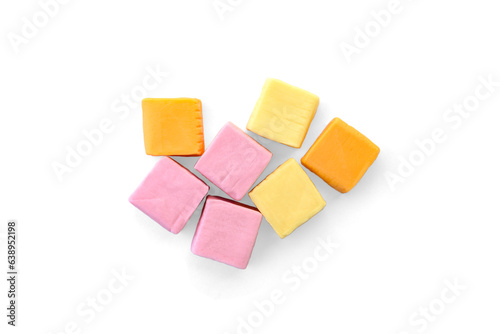 Fotografia Pile of color square chewable candies isolated on white background