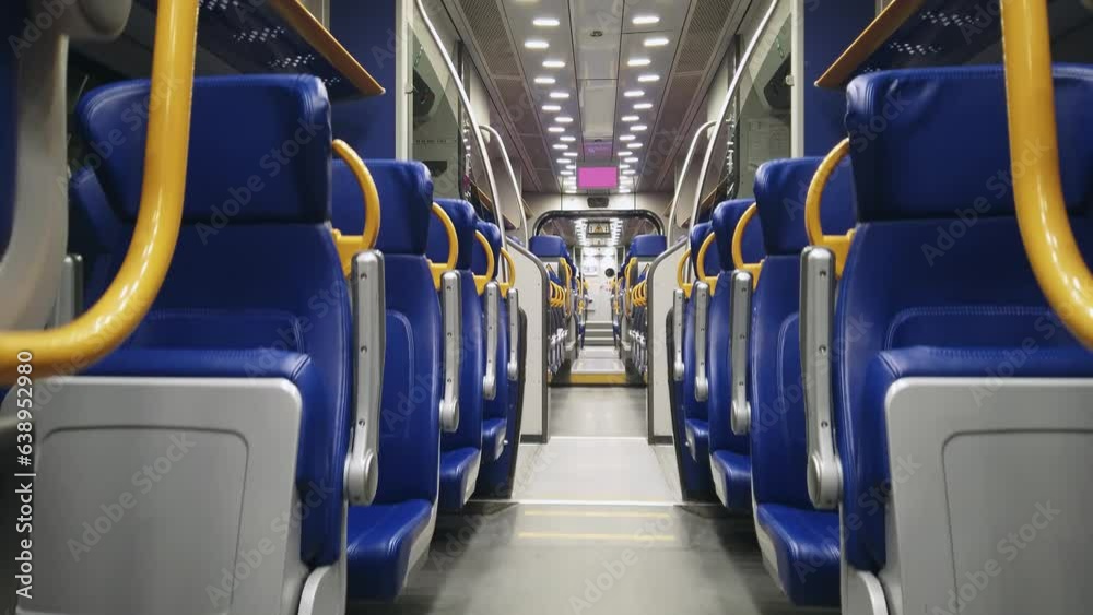 Interior of the modern high speed train driving on night route from Fiumicino airport to Termini railway stantion in Rome