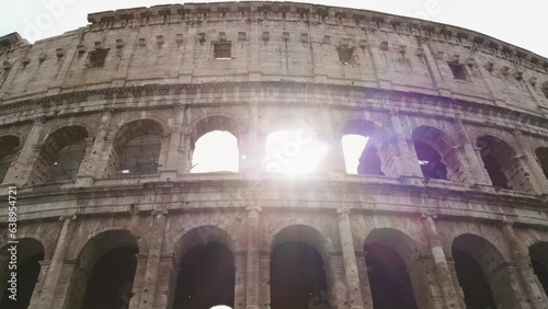 Sightseeing of facade of famous landmark Coliseum or Flavian Amphitheatre, Amphitheatrum Flavium or Colosseo, Rome, Italy photo