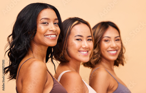 Happy, women and portrait of skincare with diversity in beauty, studio or beige background and friends or group in salon. Natural, cosmetics and female models with confidence, pride and self care