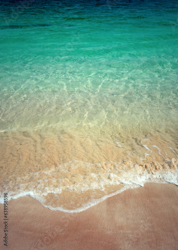 Beach and waves from top view. Turquoise water background from top view. Summer seascape. Travel concept and idea. High quality photo. Handa Island, Scotland photo