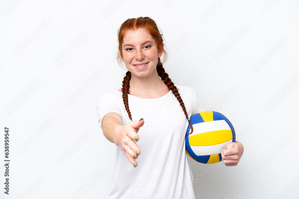 Young caucasian reddish woman playing volleyball isolated on white background shaking hands for closing a good deal Young caucasian reddish woman playing volleyball isolated on white background shaking hands for closing a good deal