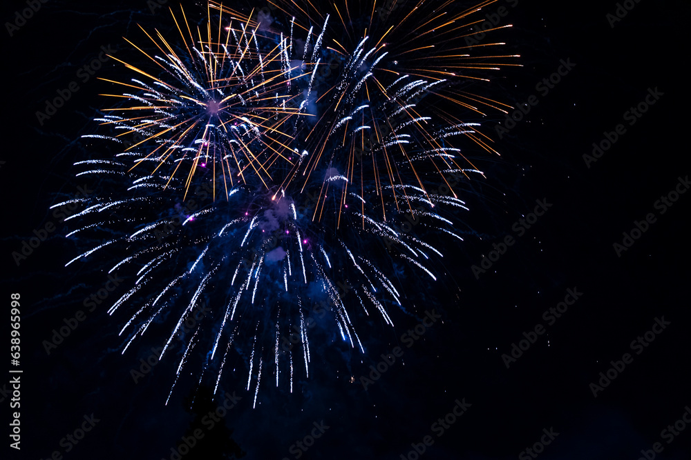 Beautiful blue firework at night. Selective focus. Beautiful blue firework at night. Selective focus.