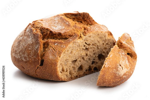 Round dark bread with cracked baked crust photo