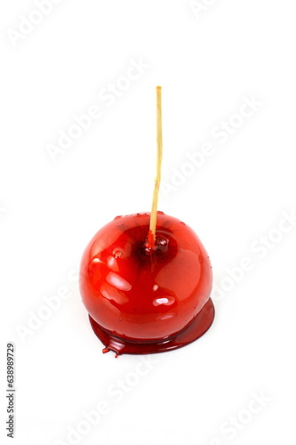 Toffee apple on white background.