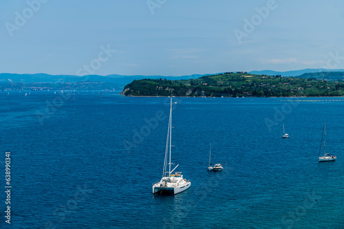 A view towards boats moored in the Gulf of Trieste from the town of Piran, Slovenia in summertime